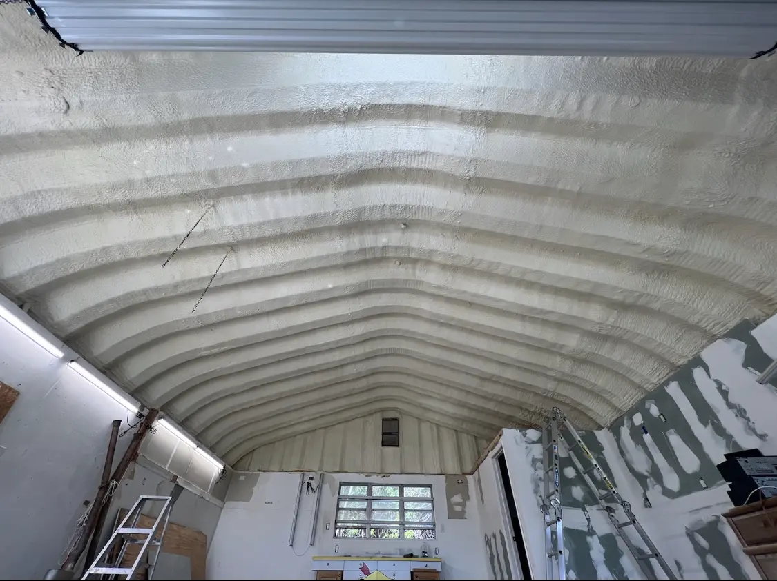 Spray polyurethane foam applied to the underside of a metal roof deck in Winona Lake